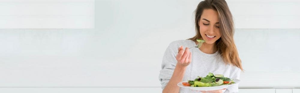 Woman eating a salad
